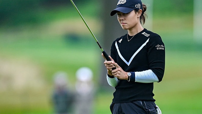 Jun 23, 2023; Springfield, New Jersey, USA; Danielle Kang lines up a shot from the bunker on the 18th hole during the second round of the KPMG Women's PGA Championship golf tournament. Mandatory Credit: John Jones-USA TODAY Sports