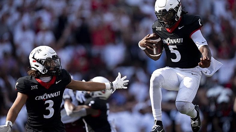 Sep 2, 2023; Cincinnati, Ohio, USA; Cincinnati Bearcats quarterback Emory Jones (5) celebrates after scoring a touchdown as Cincinnati Bearcats wide receiver Evan Prater (3) celebrates with him in the second quarter of the NCAA football game between the Cincinnati Bearcats and the Eastern Kentucky Colonels at Nippert Stadium. Mandatory Credit: Albert Cesare-USA TODAY Sports