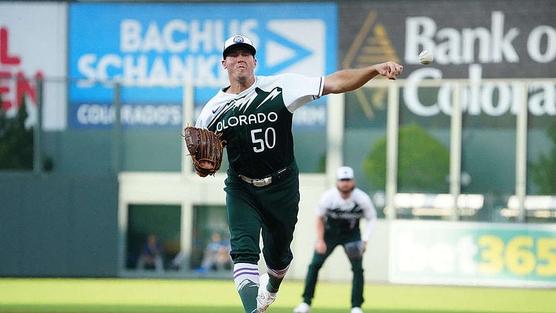 Sep 2, 2023; Denver, Colorado, USA; Colorado Rockies starting pitcher Ty Blach (50) delivers against the Toronto Blue Jays in the first inning at Coors Field. Mandatory Credit: Ron Chenoy-USA TODAY Sports