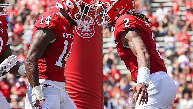 Sep 3, 2023; Piscataway, New Jersey, USA; Rutgers Scarlet Knights quarterback Gavin Wimsatt (2) celebrates his touchdown with wide receiver Isaiah Washington (14) during the first half against the Northwestern Wildcats at SHI Stadium. Mandatory Credit: Vincent Carchietta-USA TODAY Sports