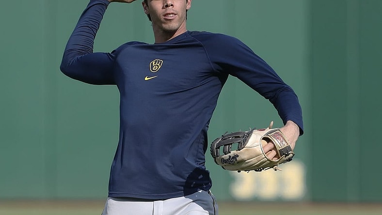 Sep 5, 2023; Pittsburgh, Pennsylvania, USA; Milwaukee Brewers left fielder Christian Yelich (22) warms up before the game against the Pittsburgh Pirates at PNC Park. Mandatory Credit: Charles LeClaire-USA TODAY Sports