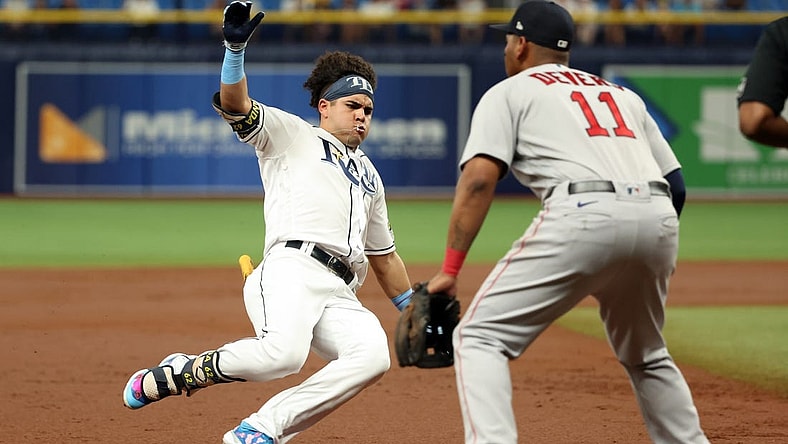 Sep 5, 2023; St. Petersburg, Florida, USA; Tampa Bay Rays second baseman Jonathan Aranda (62) hits a RBI triple during the second inning against the Boston Red Sox at Tropicana Field. Mandatory Credit: Kim Klement Neitzel-USA TODAY Sports