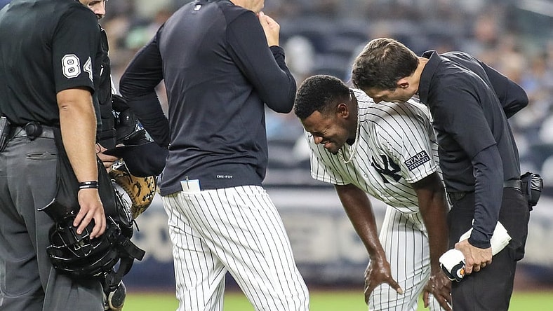 Sep 8, 2023; Bronx, New York, USA; New York Yankees starting pitcher Luis Severino (40) grimaces after getting injured in the fifth inning against the Milwaukee Brewers at Yankee Stadium. Mandatory Credit: Wendell Cruz-USA TODAY Sports