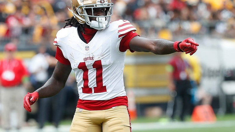 Sep 10, 2023; Pittsburgh, Pennsylvania, USA; San Francisco 49ers wide receiver Brandon Aiyuk (11) gestures at the line of scrimmage against the Pittsburgh Steelers during the first quarter at Acrisure Stadium. Mandatory Credit: Charles LeClaire-USA TODAY Sports
