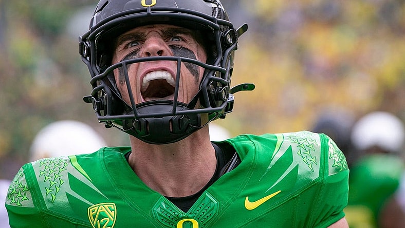 Oregon quarterback Bo Nix celebrates after running for a touchdown as the Oregon Ducks host Colorado in the Pac-12 opener Saturday, Sept. 23, 2023, at Autzen Stadium in Eugene, Ore.
