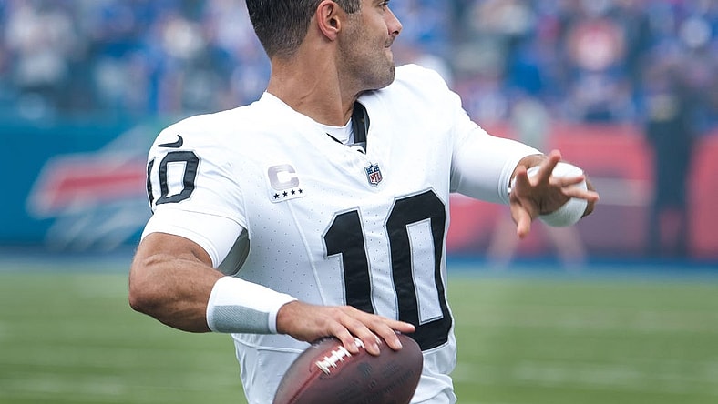Sep 17, 2023; Orchard Park, New York, USA; Las Vegas Raiders quarterback Jimmy Garoppolo (10) warms up before a game against the Buffalo Bills at Highmark Stadium. Mandatory Credit: Mark Konezny-USA TODAY Sports