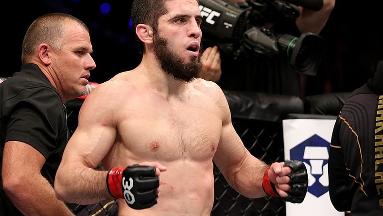 Feb 12, 2023; Perth, WA, AUSTRALIA; Islam Makhachev (red gloves) fights Alexander Volkanovski (blue gloves) during UFC 284 at RAC Arena. Mandatory Credit: Jasmin Frank-USA TODAY Sports