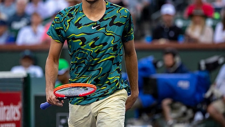 Taylor Fritz of the United States celebrates a point against Jannik Sinner of Italy during their quarterfinal match at the BNP Paribas Open at the Indian Wells Tennis Garden in Indian Wells, Calif., Thursday, March 16, 2023.