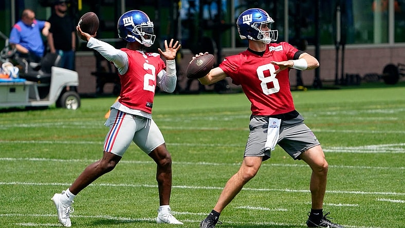 New York Giants quarterbacks Daniel Jones (8) and Tyrod Taylor (2) throw the ball on the first day of mandatory minicamp at the Giants training center in East Rutherford on Tuesday, June 13, 2023.