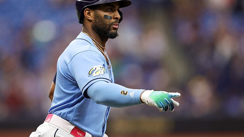 Sep 23, 2023; St. Petersburg, Florida, USA;  Tampa Bay Rays first baseman Yandy Diaz (2) celebrates after hitting a solo home run against the Toronto Blue Jays in the first inning at Tropicana Field. Mandatory Credit: Nathan Ray Seebeck-USA TODAY Sports