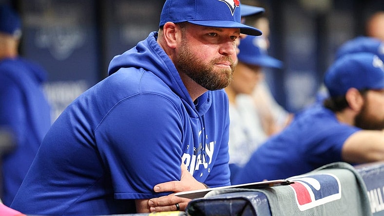 Sep 23, 2023; St. Petersburg, Florida, USA; Toronto Blue Jays manager John Schneider (14) looks on from the dugout against the Tampa Bay Rays in the eighth inning at Tropicana Field. Mandatory Credit: Nathan Ray Seebeck-USA TODAY Sports