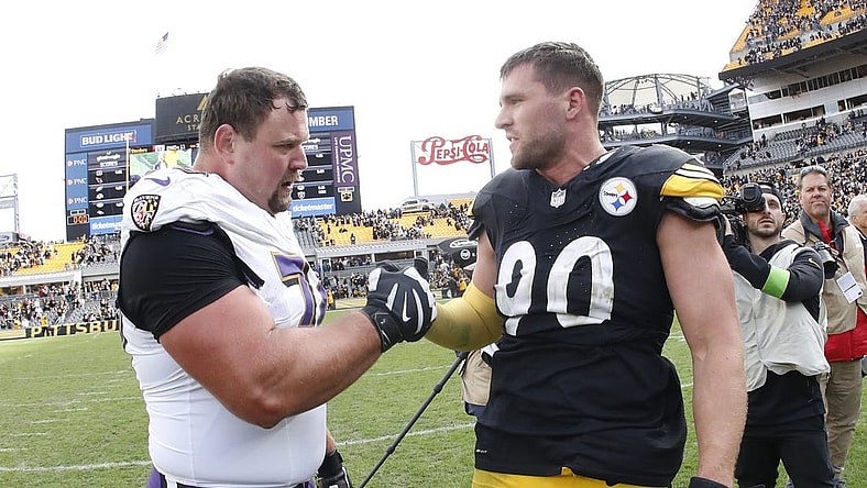 Oct 8, 2023; Pittsburgh, Pennsylvania, USA; Baltimore Ravens guard Kevin Zeitler (70) and Pittsburgh Steelers linebacker T.J. Watt (90) shake hands after their game at Acrisure Stadium. Pittsburgh won 17-10. Mandatory Credit: Charles LeClaire-USA TODAY Sports