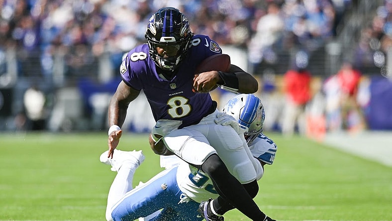 Oct 22, 2023; Baltimore, Maryland, USA;  Baltimore Ravens quarterback Lamar Jackson (8) runs of a first half first down against the Detroit Lions at M&T Bank Stadium. Mandatory Credit: Tommy Gilligan-USA TODAY Sports