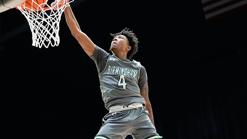 Mar 10, 2023; Frisco, TX, USA;  UAB Blazers guard Eric Gaines (4) dunks the ball against the North Texas Mean Green during the first half at Ford Center at The Star. Mandatory Credit: Chris Jones-USA TODAY Sports