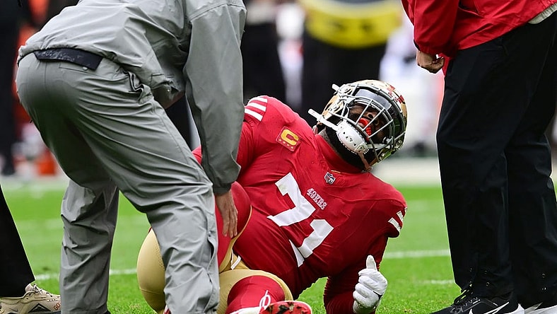 Oct 15, 2023; Cleveland, Ohio, USA; San Francisco 49ers offensive tackle Trent Williams (71) is looked at by trainers during the first half against the Cleveland Browns at Cleveland Browns Stadium. Mandatory Credit: Ken Blaze-USA TODAY Sports