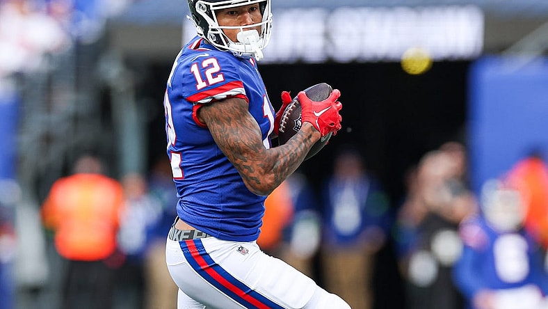 Oct 22, 2023; East Rutherford, New Jersey, USA; New York Giants tight end Darren Waller (12) catches the ball during the first half Washington Commanders at MetLife Stadium. Mandatory Credit: Vincent Carchietta-USA TODAY Sports