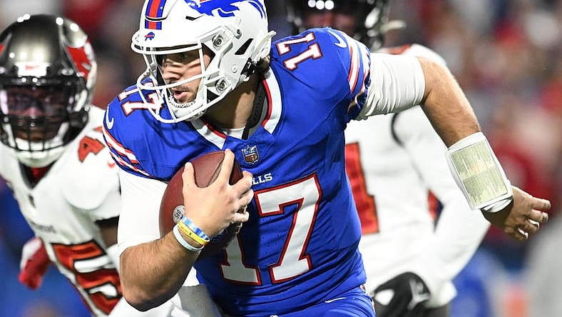 Oct 26, 2023; Orchard Park, New York, USA; Buffalo Bills quarterback Josh Allen (17) runs the ball against the Tampa Bay Buccaneers in the first quarter at Highmark Stadium. Mandatory Credit: Mark Konezny-USA TODAY Sports