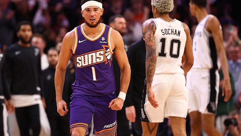 Nov 2, 2023; Phoenix, Arizona, USA; Phoenix Suns guard Devin Booker (1) celebrates a shot against the San Antonio Spurs in the second half at Footprint Center. Mandatory Credit: Mark J. Rebilas-USA TODAY Sports