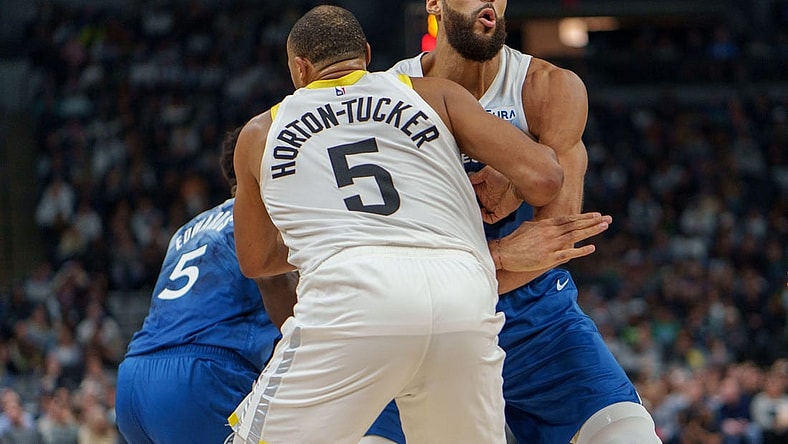 Nov 4, 2023; Minneapolis, Minnesota, USA; Minnesota Timberwolves center Rudy Gobert (27) sets a screen on Utah Jazz guard Talen Horton-Tucker (5) in the second quarter at Target Center. Mandatory Credit: Matt Blewett-USA TODAY Sports