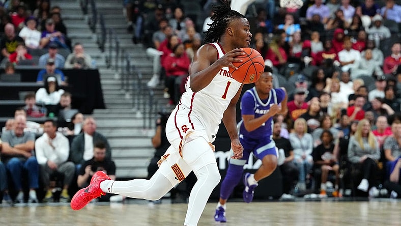 Nov 6, 2023; Las Vegas, Nevada, USA; USC Trojans guard Isaiah Collier (1) dribbles against the Kansas State Wildcats during the first half at T-Mobile Arena. Mandatory Credit: Stephen R. Sylvanie-USA TODAY Sports