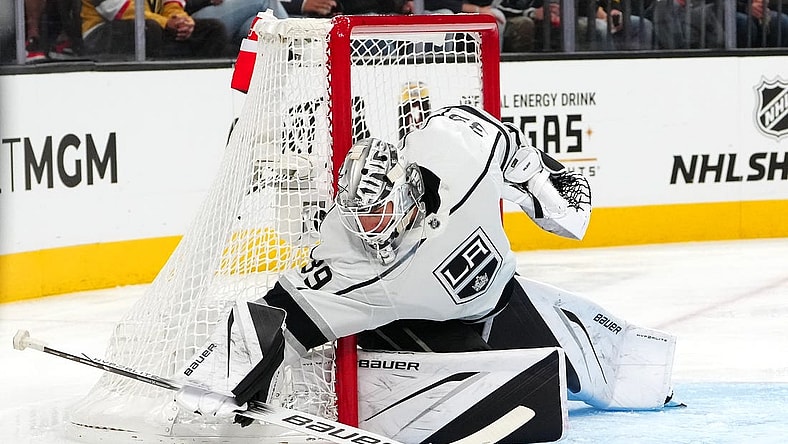 Nov 8, 2023; Las Vegas, Nevada, USA; Los Angeles Kings goaltender Cam Talbot (39) covers up a Vegas Golden Knights dump in during the second period at T-Mobile Arena. Mandatory Credit: Stephen R. Sylvanie-USA TODAY Sports