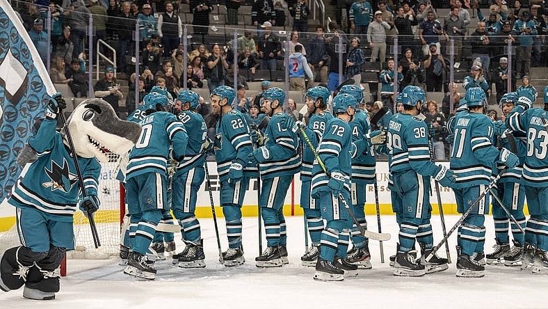 Nov 9, 2023; San Jose, California, USA; San Jose Sharks goaltender Mackenzie Blackwood (29) and San Jose Sharks center Ryan Carpenter (22) and San Jose Sharks left wing Fabian Zetterlund (20) and teammates celebrate after the win against the Edmonton Oilers at SAP Center at San Jose. Mandatory Credit: Neville E. Guard-USA TODAY Sports