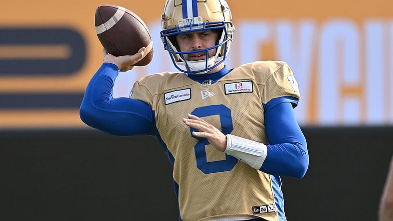 Nov 16, 2023; Hamilton, Ontario, CAN; Winnipeg Blue Bombers quarterback Zach Collaros (8) throws a pass during practice at Tim Hortons Field. Mandatory Credit: Dan Hamilton-USA TODAY Sports