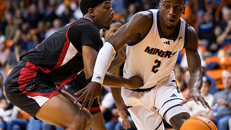 UTEP's Tae Hardy (2) dribbles the ball at a men's basketball game against Austin Peay on Friday, Nov. 17, 2023, at the Don Haskins Center in El Paso, Texas.