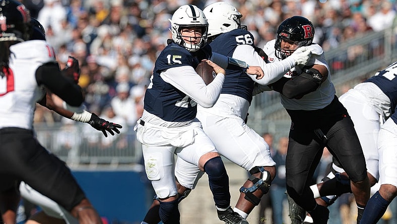 Nov 18, 2023; University Park, Pennsylvania, USA; Penn State Nittany Lions quarterback Drew Allar (15) carries the ball during the first half against the Rutgers Scarlet Knights at Beaver Stadium. Mandatory Credit: Vincent Carchietta-USA TODAY Sports