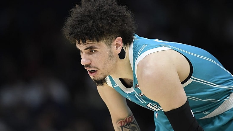 Nov 20, 2023; Charlotte, North Carolina, USA; Charlotte Hornets guard LaMelo Ball (1) in a time out during the first half against the Boston Celtics at the Spectrum Center. Mandatory Credit: Sam Sharpe-USA TODAY Sports