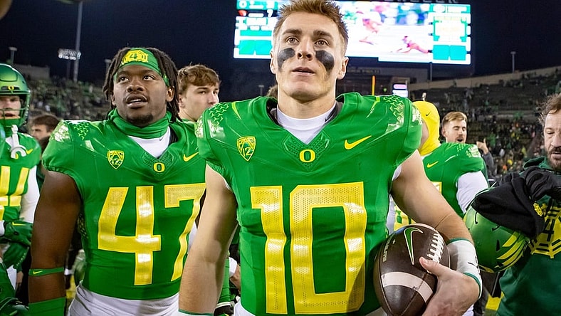 Oregon quarterback Bo Nix walks off the field after the the No. 6 Oregon Ducks defeated the No. 16 Oregon State Beavers Friday, Nov. 24, 2023, at Autzen Stadium in Eugene, Ore.
