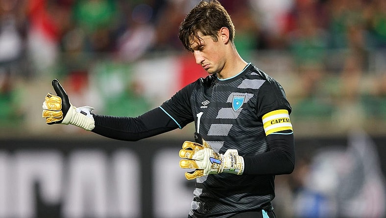 Apr 27, 2022; Orlando, FL, USA; Guatemala goalkeeper Nicholas Hagen (1) reacts after a missed free kick attempt during a match against Mexico at Camping World Stadium. Mandatory Credit: Nathan Ray Seebeck-USA TODAY Sports