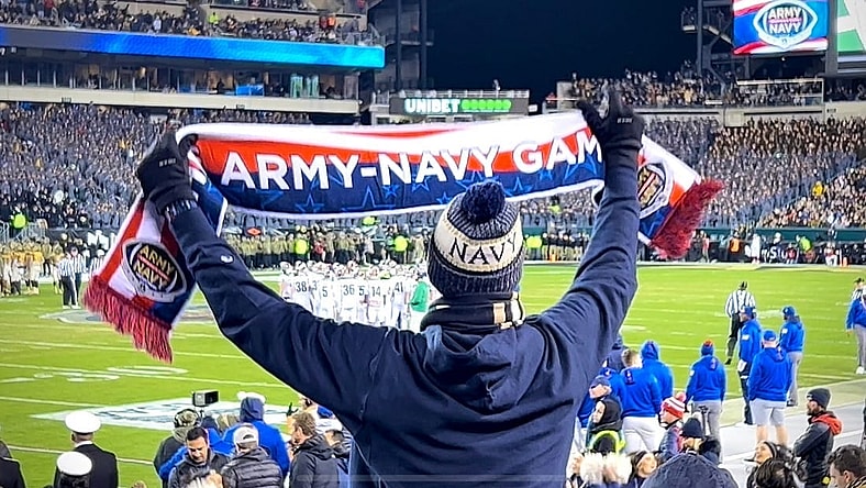 A Navy fan urges on the Midshipmen as the Army-Navy game goes to overtime for the first time in the rivalry's history. Army won 20-17 in the second overtime.
Img 2166