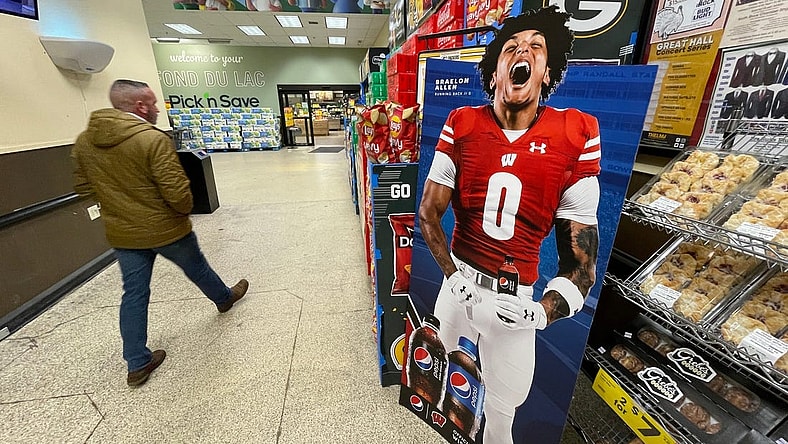 A promotional display for Pepsi featuring Wisconsin running back Braelon Allen is shown in November 2022 at a Pick 'n Save store in Fond du Lac, Wis. When the NCAA enacted Name Image Likeness (NIL) legislation in July 2021 it gave athletes the opportunity to earn money off endorsements as well as use their name in support of causes important to them.