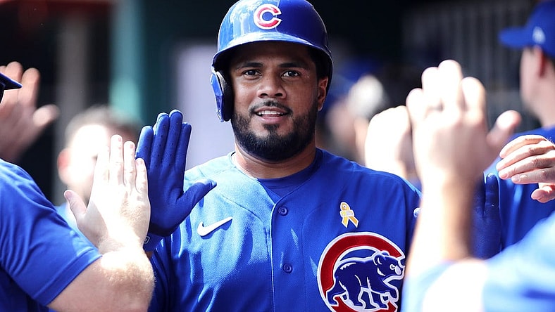Sep 3, 2023; Cincinnati, Ohio, USA; Chicago Cubs third baseman Jeimer Candelario (9) reacts in the dugout after scoring against the Cincinnati Reds during the eighth inning at Great American Ball Park. Mandatory Credit: David Kohl-USA TODAY Sports