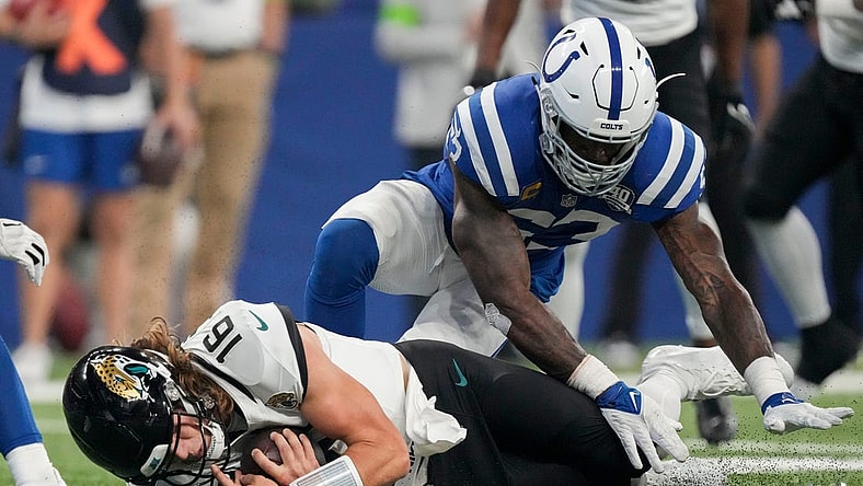 Former Colts linebacker Shaquille Leonard (53) covers Jacksonville Jaguars quarterback Trevor Lawrence (16) as he goes to the turf Sunday, Sept. 10, 2023, during a game against the Jacksonville Jaguars at Lucas Oil Stadium in Indianapolis.