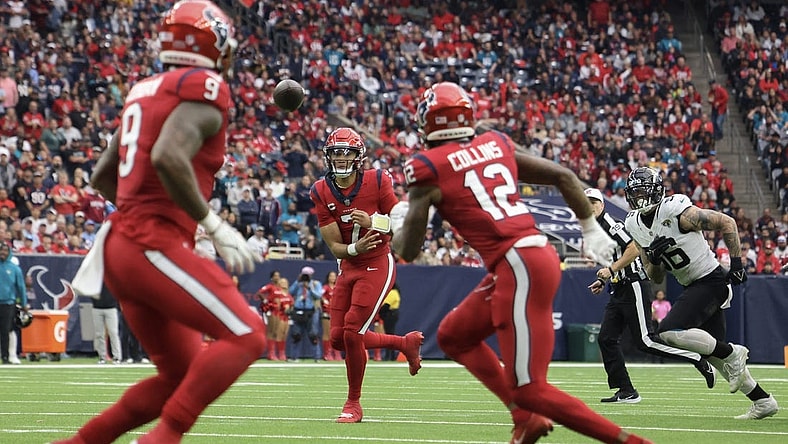 Houston Texans quarterback C.J. Stroud (7) throws a touchdown pass to  wide receiver Nico Collins (12) against the Jacksonville Jaguars in the second half at NRG Stadium. Mandatory Credit: Thomas Shea-USA TODAY Sports