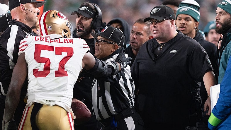 Dec 3, 2023; Philadelphia, Pennsylvania, USA; San Francisco 49ers linebacker Dre Greenlaw (57) has an altercation with Philadelphia Eagles staff member Dom DiSandro during the third quarter at Lincoln Financial Field. Mandatory Credit: Bill Streicher-USA TODAY Sports