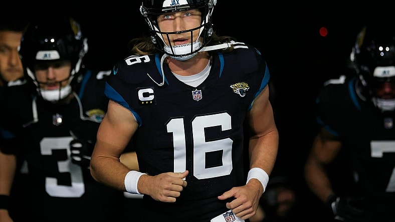 Jacksonville Jaguars quarterback Trevor Lawrence (16) leads his team onto the field before a regular season NFL football matchup Monday, Dec. 4, 2023 at EverBank Stadium in Jacksonville, Fla. The Cincinnati Bengals defeated the Jacksonville Jaguars 34-31 in overtime. [Corey Perrine/Florida Times-Union]