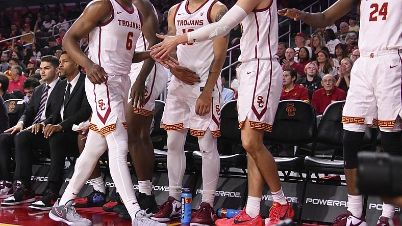 Dec 10, 2023; Los Angeles, California, USA; USC Trojans guard Bronny James (6) returns to the bench during the first half against the Long Beach State 49ers at Galen Center. Mandatory Credit: Robert Hanashiro-USA TODAY Sports