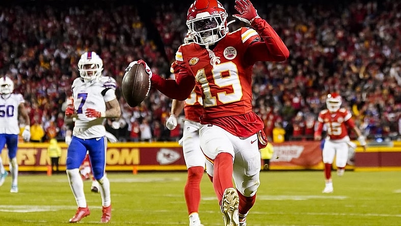 Dec 10, 2023; Kansas City, Missouri, USA; Kansas City Chiefs wide receiver Kadarius Toney (19) scores a touchdown during the second half against the Buffalo Bills at GEHA Field at Arrowhead Stadium. The play would be called back due to an offensive penalty. Mandatory Credit: Jay Biggerstaff-USA TODAY Sports