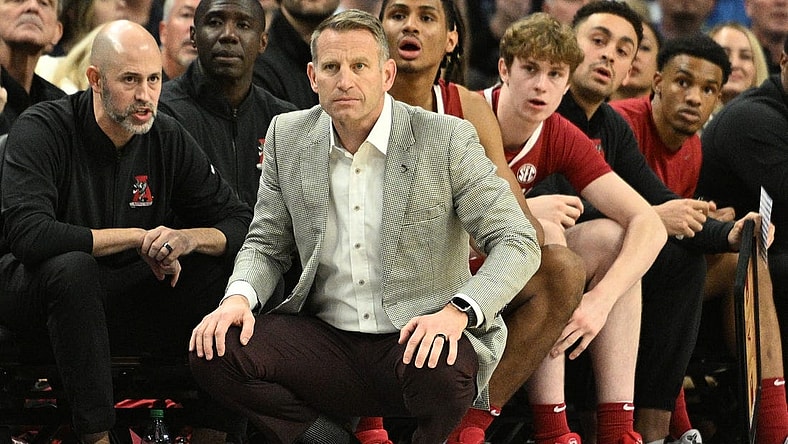 Dec 16, 2023; Omaha, Nebraska, USA; Alabama Crimson Tide head coach Nate Oats watches action against the Creighton Bluejays in the first half at CHI Health Center Omaha. Mandatory Credit: Steven Branscombe-USA TODAY Sports