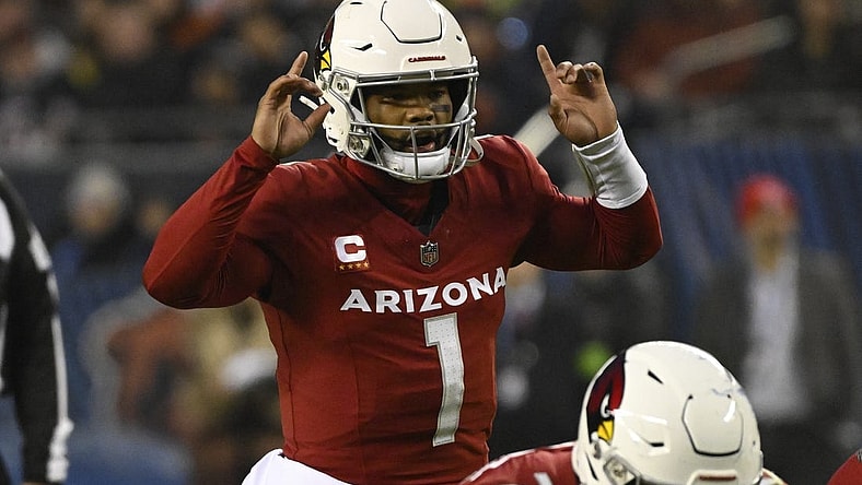 Dec 24, 2023; Chicago, Illinois, USA;  Arizona Cardinals quarterback Kyler Murray (1) signals to his team against the Chicago Bears during the first half at Soldier Field. Mandatory Credit: Matt Marton-USA TODAY Sports