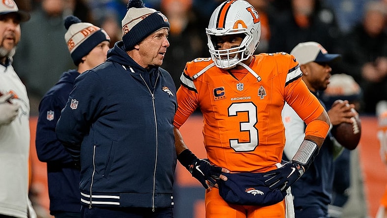 Dec 24, 2023; Denver, Colorado, USA; Denver Broncos head coach Sean Payton talks with quarterback Russell Wilson (3) before the game against the New England Patriots at Empower Field at Mile High. Mandatory Credit: Isaiah J. Downing-USA TODAY Sports