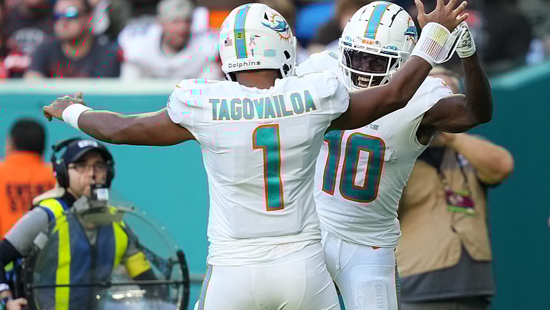 Miami Dolphins' Tua Tagovailoa and Tyreek Hill