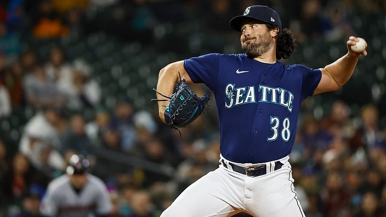 Mar 31, 2023; Seattle, Washington, USA; Seattle Mariners starting pitcher Robbie Ray (38) throws against the Cleveland Guardians during the first inningat T-Mobile Park. Mandatory Credit: Joe Nicholson-USA TODAY Sports