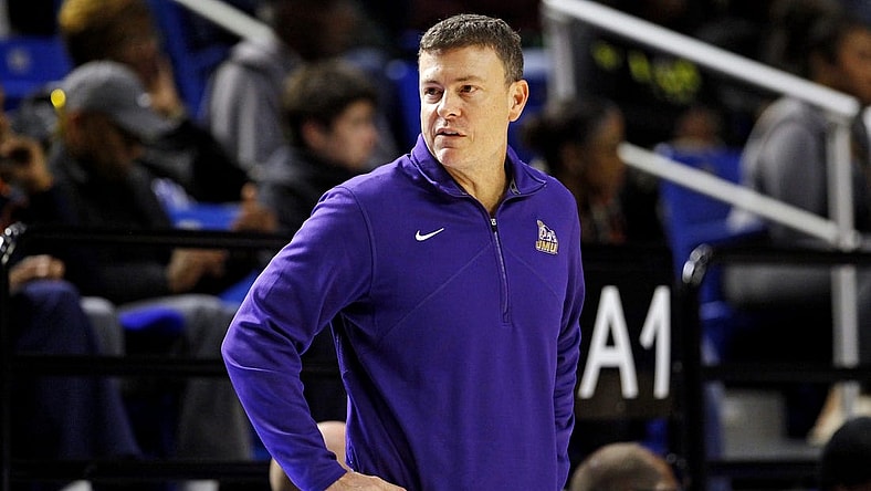 Dec 16, 2023; Hampton, Virginia, USA; James Madison Dukes head coach Mark Byington looks on during the second half of the game against the Hampton Pirates at Hampton Convocation Center. Mandatory Credit: Peter Casey-USA TODAY Sports