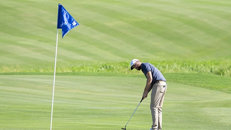 January 6, 2024; Maui, Hawaii, USA; Chris Kirk putts on the 18th hole during the third round of The Sentry golf tournament at Kapalua Golf - The Plantation Course. Mandatory Credit: Kyle Terada-USA TODAY Sports