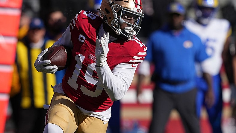 Jan 7, 2024; Santa Clara, California, USA; San Francisco 49ers wide receiver Deebo Samuel (19) runs after a catch against the Los Angeles Rams during the first quarter at Levi's Stadium. Mandatory Credit: Darren Yamashita-USA TODAY Sports