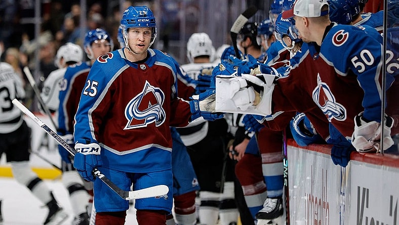 Jan 26, 2024; Denver, Colorado, USA; Colorado Avalanche right wing Logan O'Connor (25) celebrates with the bench after his second goal of the game in the first period against the Los Angeles Kings at Ball Arena. Mandatory Credit: Isaiah J. Downing-USA TODAY Sports